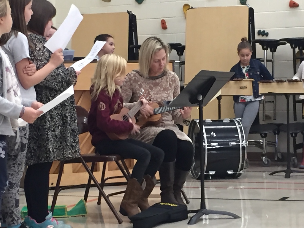 Riley James performs the song she wrote herself, alongside Mrs. Plummer